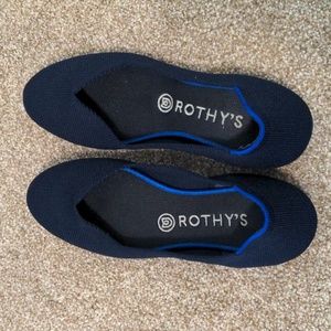 Rothy's Rounded Toe Flats in navy blue (size 8).